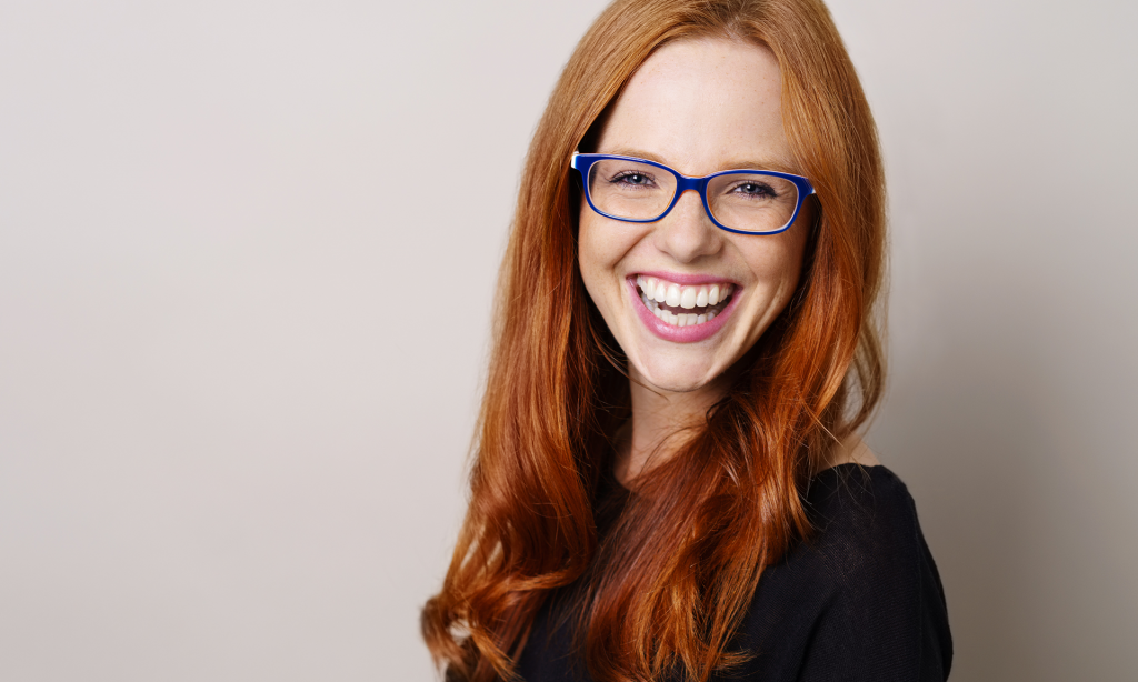 smiling woman with eyeglasses