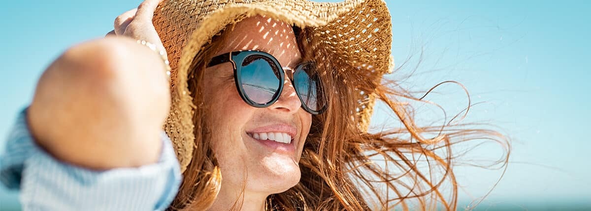 woman wearing sunglasses for sun protection