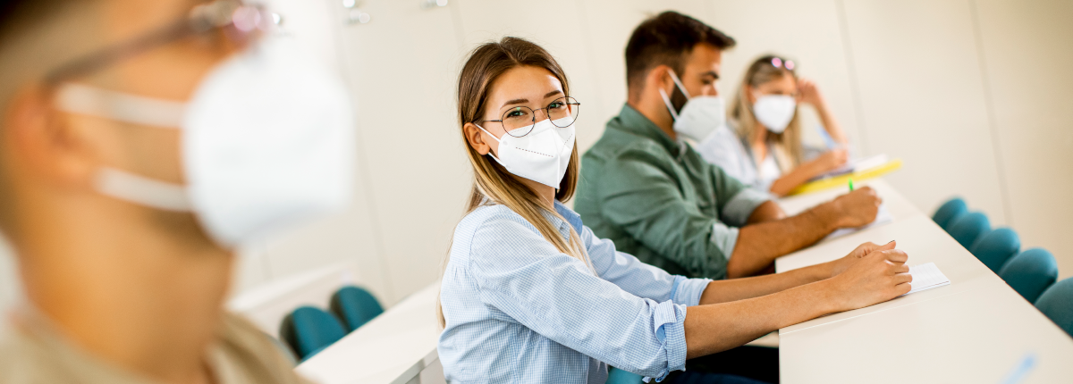 Woman in glasses and face mask